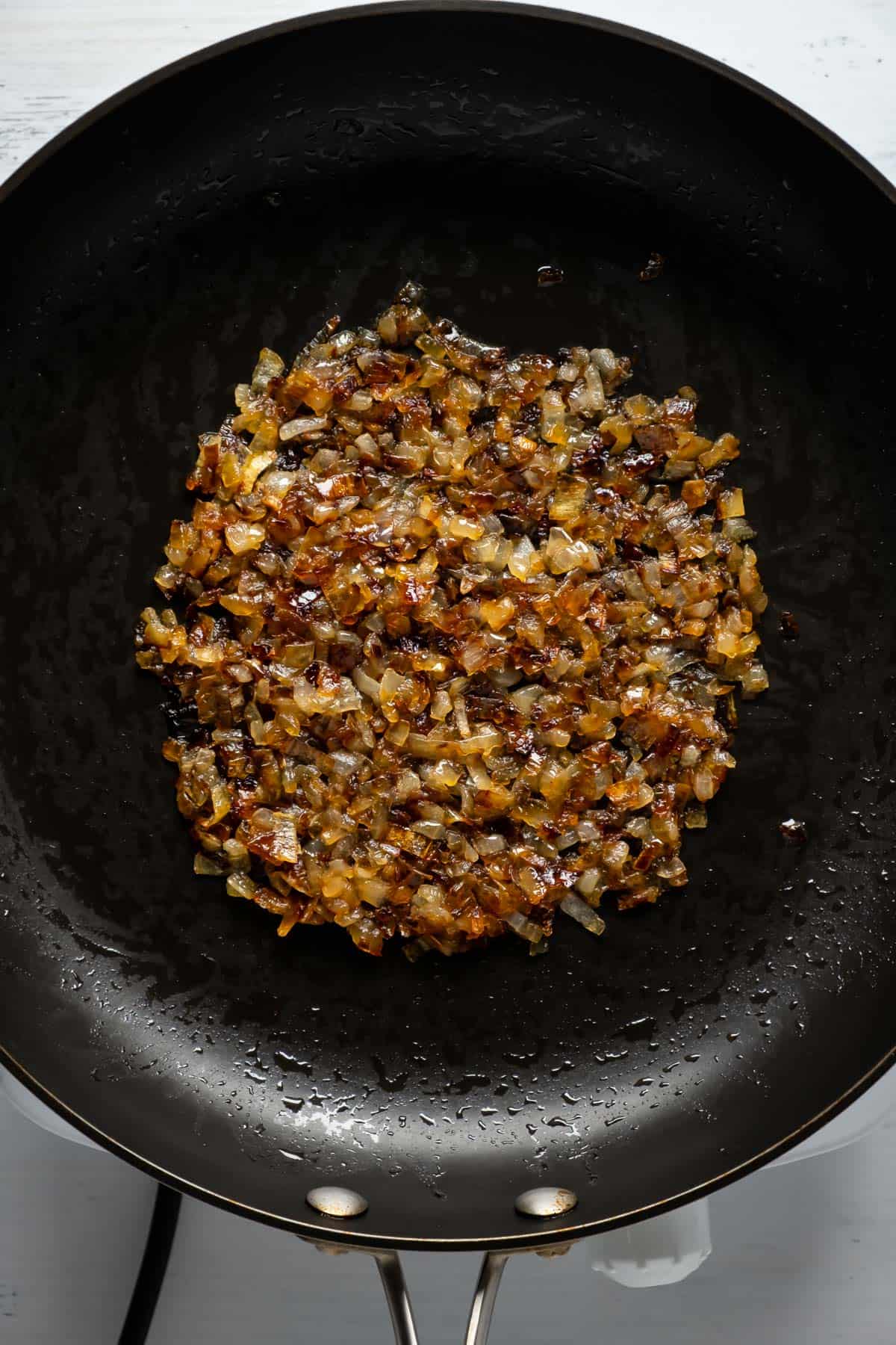 Caramelized onions in a skillet.